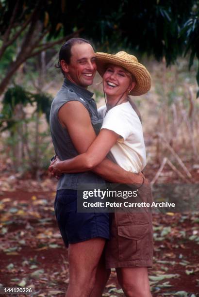 Australian actress and singer Olivia Newton-John with her husband Matt Latanzi in the 1990s.