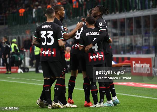 Rafael Leao of AC Milan celebrates after scoring the opening goal with his team-mates during the Serie A match between AC Milan and ACF Fiorentina at...