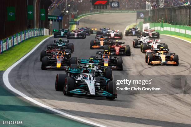 George Russell of Great Britain driving the Mercedes AMG Petronas F1 Team W13 leads the field at the start during the F1 Grand Prix of Brazil at...