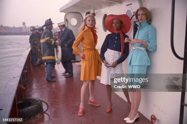 Outtake; Models wearing fashions from the Spring 1973 Ready-To-Wear collections, Left: Anne Klein's summer layers - the calico printed cotton polin...