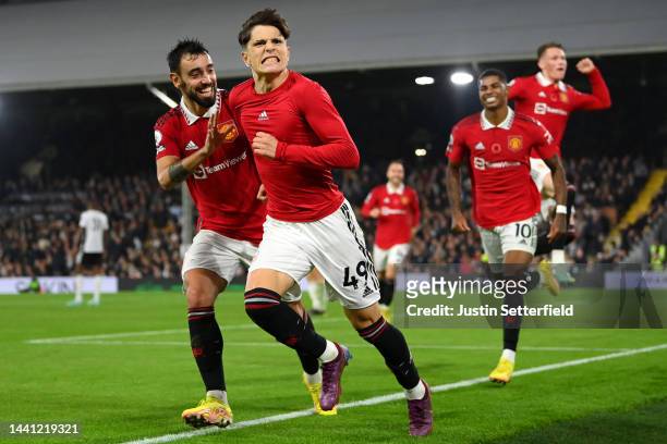 Alejandro Garnacho of Manchester United celebrates scoring their side's second goal with teammates during the Premier League match between Fulham FC...