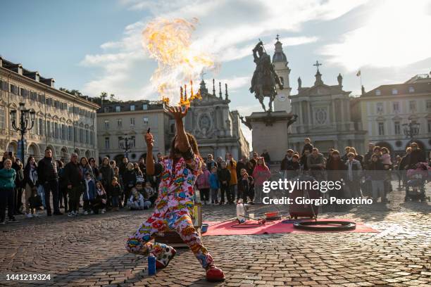 People watch street exhibitions during day one of the Nitto ATP Finals at Pala Alpitour on November 13, 2022 in Turin, Italy.