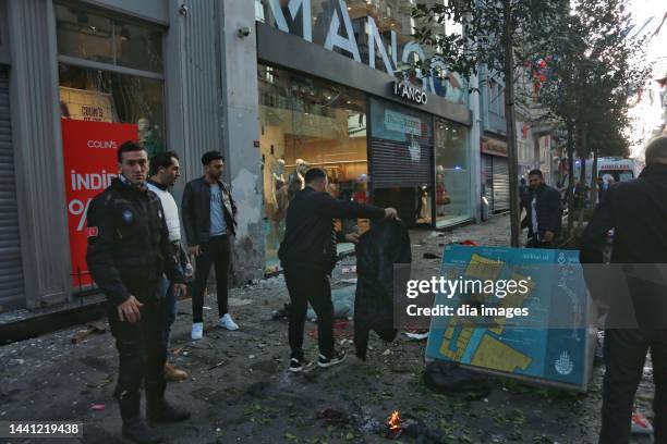 People at the scene after an explosion occurred on Istiklal street, a busy pedestrian thoroughfare on November 13, 2022 in Istanbul, Turkey. It is...