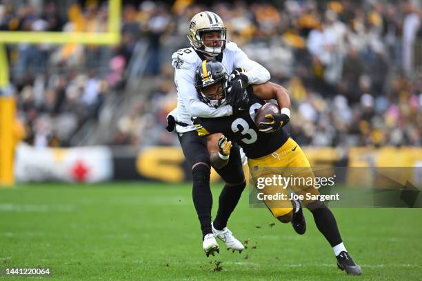 Jaylen Warren of the Pittsburgh Steelers is tackled by P.J. Williams of the New Orleans Saints during the first quarter at Acrisure Stadium on...