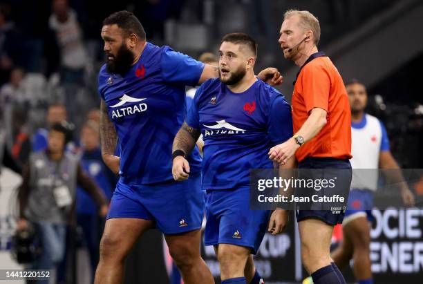 Cyril Baille of France celebrates his try with Uini Atonio of France , referee Wayne Barnes of England during the Autumn Nations Series international...