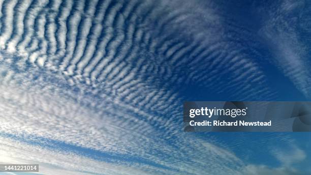 cirrocumulus clouds - cirrostratus clouds stock pictures, royalty-free photos & images