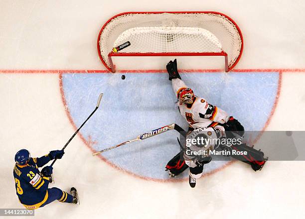 Niklas Persson of Sweden he scores his team's 3rd goal during the IIHF World Championship group S match between Sweden and Germany at Ericsson Globe...