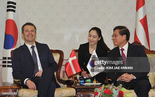 Denmark's Crown Prince Frederik talks with South Korean Prime Minister Kim Hwang-Sik during a meeting in Seoul on May 10, 2012. Frederik and his wife...