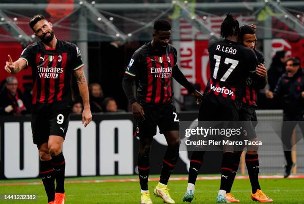 Milan players celebrate their team's second goal conceded from an own goal by Nikola Milenković of ACF Fiorentina during the Serie A match between AC...