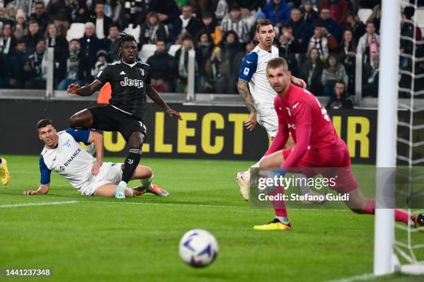 Moise Kean of Juventus FC kick the ball against Ivan Provedel of SS Lazio during the Serie A match between Juventus and SS Lazio on November 13, 2022...