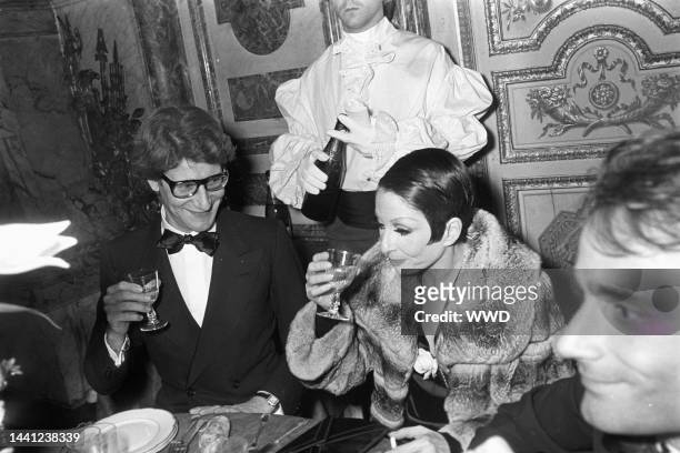 Outtake; Yves Saint Laurent and friends attend the fashion show to benefit the restoration of the Chateau of Versailles, five American designers...