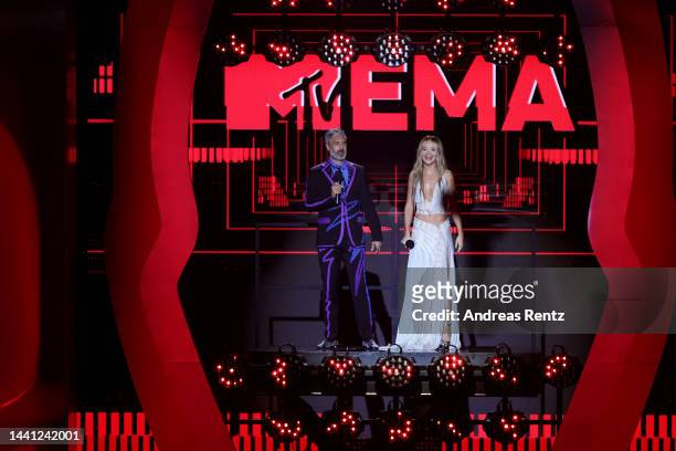 Taika Waititi and Rita Ora are seen on stage during the MTV Europe Music Awards 2022 held at PSD Bank Dome on November 13, 2022 in Duesseldorf,...