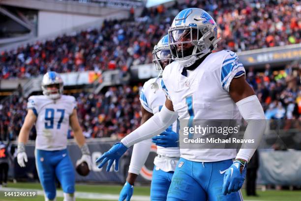 Jeff Okudah of the Detroit Lions celebrates after returning an interception for a touchdown during the fourth quarter against the Chicago Bears at...