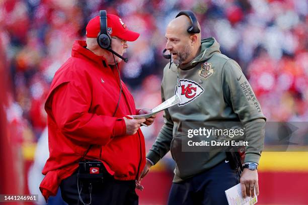 Head coach Andy Reid of the Kansas City Chiefs talks with Quarterbacks Coach Matt Nagy on the sidelines in the third quarter of the game against the...