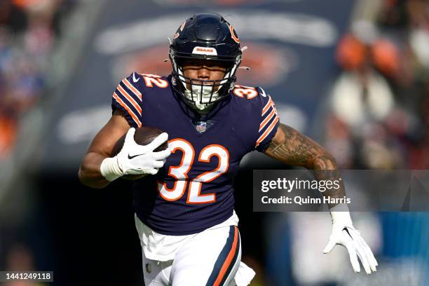 David Montgomery of the Chicago Bears runs the ball during the first quarter against the Detroit Lions at Soldier Field on November 13, 2022 in...