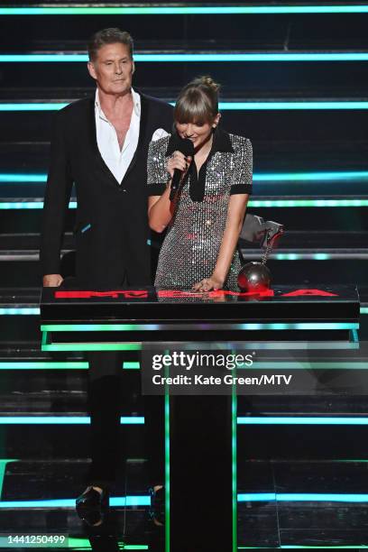 Taylor Swift accepts the Best Artist Award from David Hasselhoff on stage during the MTV Europe Music Awards 2022 held at PSD Bank Dome on November...
