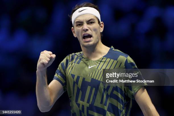 Taylor Fritz of United States celebrates winning the first set against Rafael Nadal of Spain during round robin play on Day One of the Nitto ATP...