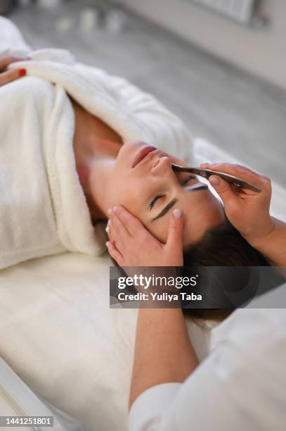 face-lift procedure - spooning stock pictures, royalty-free photos & images