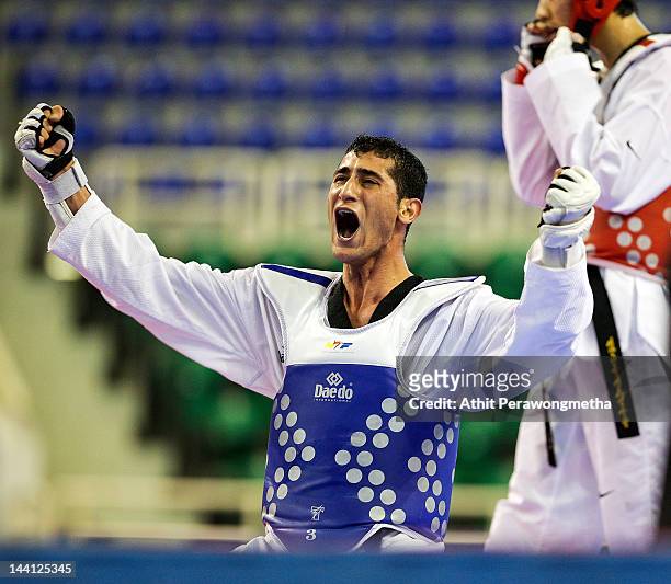 Anas Jalal Mohammad Aladarbi of Jordan reacts after winning against Seo Jong-Bin of Korea during day two of the 20th Asian Taekwondo Championships at...