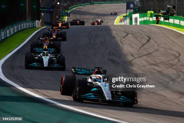 George Russell of Great Britain driving the Mercedes AMG Petronas F1 Team W13 leads the field during the F1 Grand Prix of Brazil at Autodromo Jose...