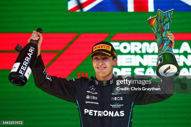 Race winner George Russell of Great Britain and Mercedes celebrates on the podium during the F1 Grand Prix of Brazil at Autodromo Jose Carlos Pace on...