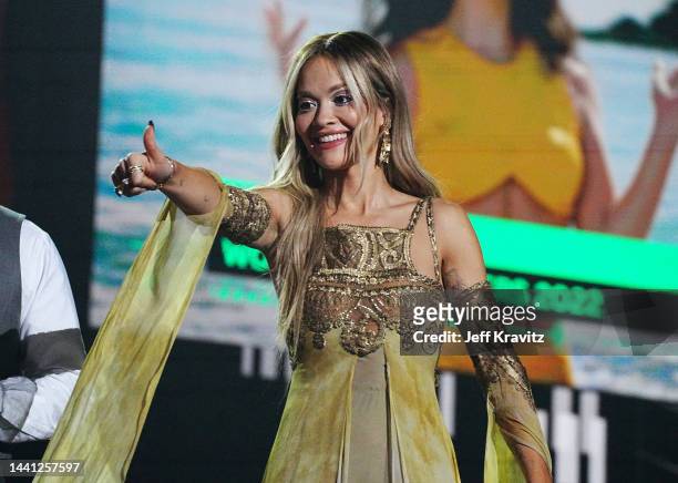 Rita Ora speaks onstage during the MTV Europe Music Awards 2022 held at PSD Bank Dome on November 13, 2022 in Duesseldorf, Germany.