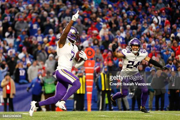 Patrick Peterson of the Minnesota Vikings and Camryn Bynum of the Minnesota Vikings celebrate after Peterson's game winning interception in overtime...