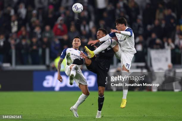 Danilo of Juventus battles for the ball with Matias Vecino and Matteo Cancellieri of SS Lazio during the Serie A match between Juventus and SS Lazio...