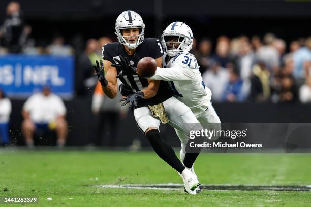 Brandon Facyson of the Indianapolis Colts blocks a ball intended for Mack Hollins of the Las Vegas Raiders during an NFL game between the Las Vegas...