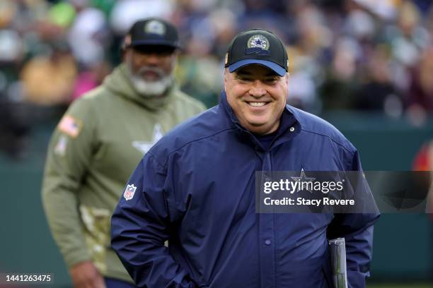 Head coach Mike McCarthy of the Dallas Cowboys smiles on during pregame against the Green Bay Packers at Lambeau Field on November 13, 2022 in Green...