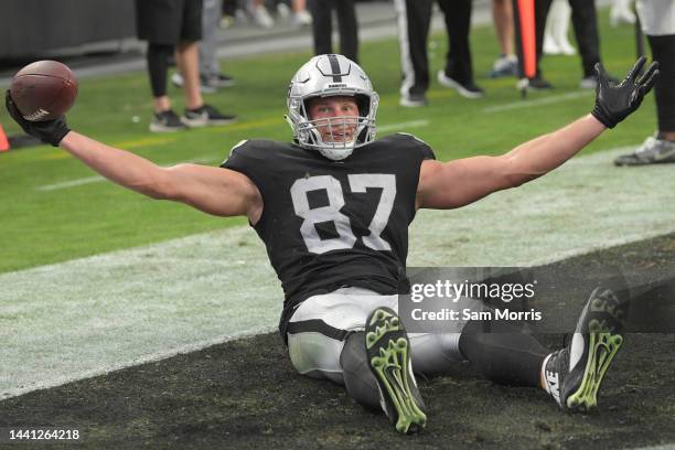 Foster Moreau of the Las Vegas Raiders reacts after scoring a touchdown in the second quarter of the game against the Indianapolis Colts at Allegiant...