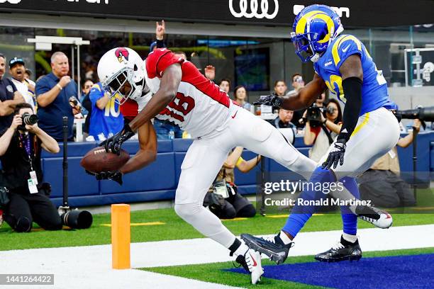 Green of the Arizona Cardinals scores a touchdown over David Long Jr. #22 of the Los Angeles Rams in the second quarter of the game at SoFi Stadium...