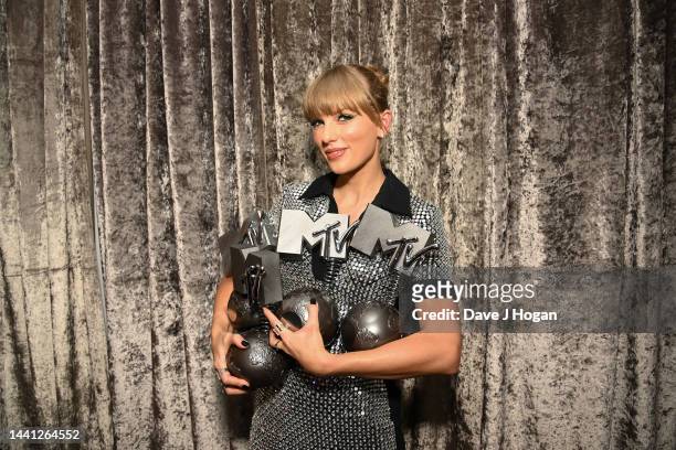 Taylor Swift is seen backstage with the Best Artist, Best Video, Best Pop and Best Longform Video Awards during the Best MTV Europe Music Awards 2022...