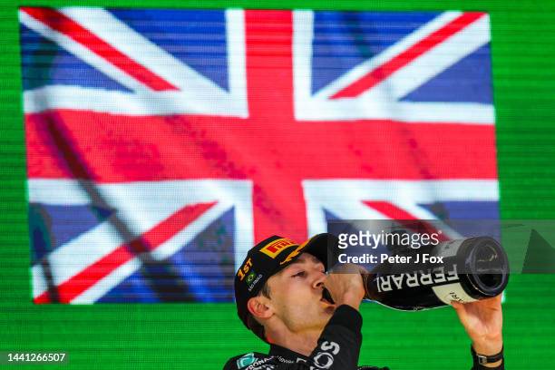 George Russell of Mercedes and Great Britain celebrates winning his first Formula One Grand Prix during the F1 Grand Prix of Brazil at Autodromo Jose...