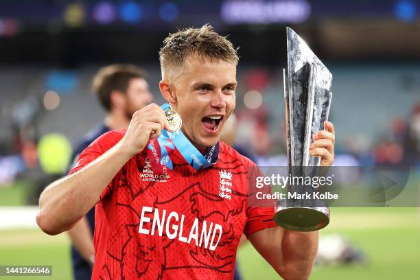 Sam Curran of England poses with the trophy as they celebrate victory in the ICC Men's T20 World Cup Final match between Pakistan and England at the...