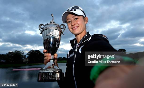 Nelly Korda of the United States poses with the trophy after winning the Pelican Women's Championship at Pelican Golf Club on November 13, 2022 in...