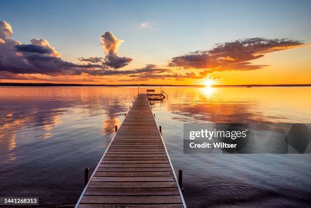 dewitt landing  golden refection's sunset - september stockfoto's en -beelden