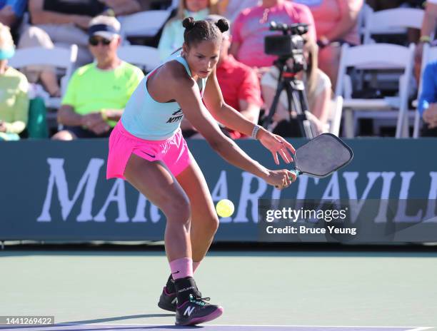 Jessie Irvine hits a backhand slice shot against Anna Leigh Waters and Catherine Parenteau in the Pro Women's Doubles championship match of the 2022...