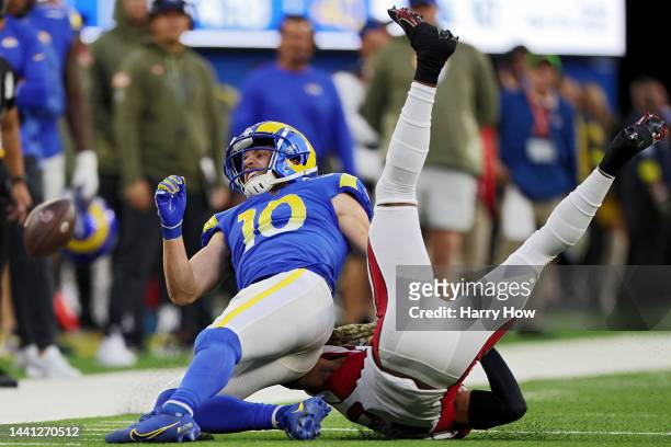 Cooper Kupp of the Los Angeles Rams reacts after being hit by Marco Wilson of the Arizona Cardinals in the fourth quarter of the game at SoFi Stadium...