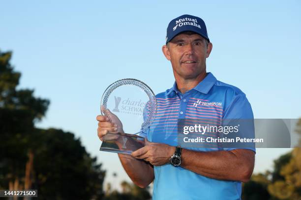 Padraig Harrington of Ireland poses with the Charles Schwab Cup Championship trophy at Phoenix Country Club on November 13, 2022 in Phoenix, Arizona.