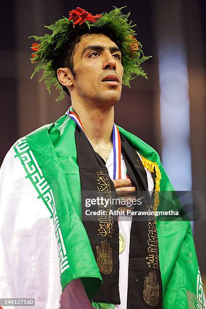 Gold Medalist Alireza Nassrazadany of Iran poses on a podium during day two of the 20th Asian Taekwondo Championships at Phu Tho Stadium on May 10,...