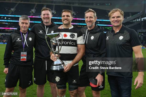 Ronan O'Gara, Donnacha Ryan, Luke Whitelock, Will Greenwood and Scott Robinson of Barbarians celebrate after winning the Killik Cup match between...