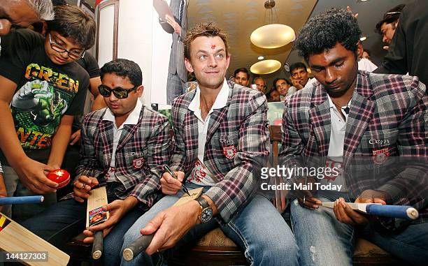Kings XI Punjab team Members Adam Gilchrist, Piyush Chawla and Parvinder Awana at a event in Delhi on Wednesday.