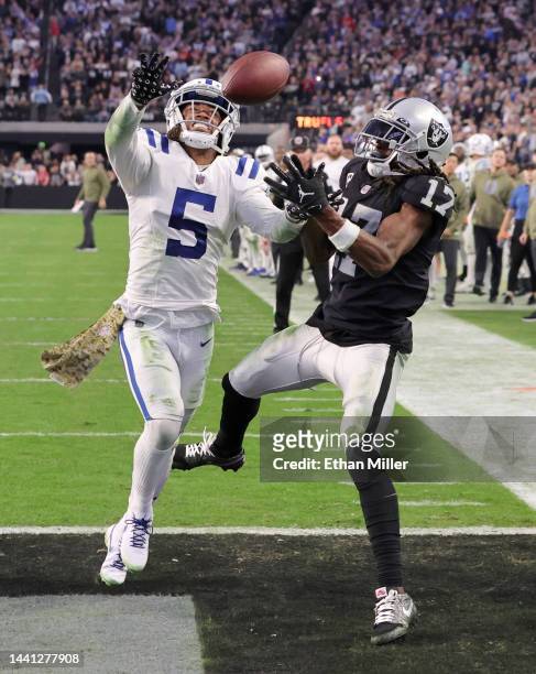 Cornerback Stephon Gilmore of the Indianapolis Colts breaks up a pass intended for wide receiver Davante Adams of the Las Vegas Raiders late in the...