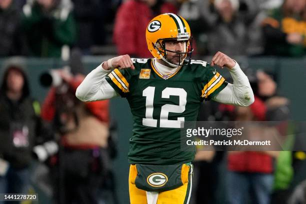 Aaron Rodgers of the Green Bay Packers celebrates after a play during overtime against the Dallas Cowboys at Lambeau Field on November 13, 2022 in...