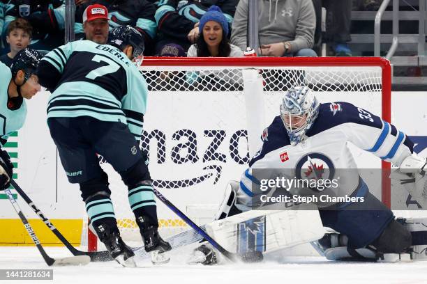 Jordan Eberle of the Seattle Kraken scores against David Rittich of the Winnipeg Jets during the first period at Climate Pledge Arena on November 13,...