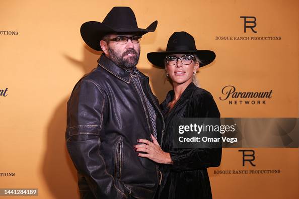 Jake Ream and guest attends the black carpet during "Yellowstone