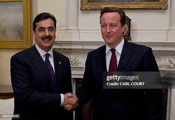 British Prime Minister David Cameron meets with Pakistan's Prime Minister Yousuf Raza Gilani in 10 Downing Street, London, on May 10, 2012. AFP...