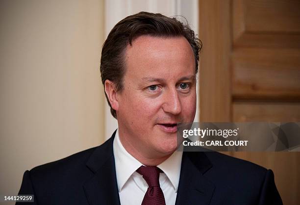 British Prime Minister David Cameron is pictured during a meeting with Pakistan's Prime Minister Yousuf Raza Gilani in10 Downing Street, London, on...