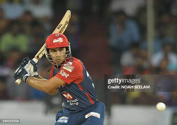 Delhi Daredevils batsman Naman Ojha plays a shot during the IPL Twenty20 cricket match between the Deccan Chargers and Delhi Daredevils at Rajiv...